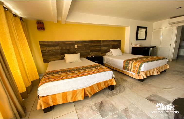 Condominio Vacacional 305-A Hotel Tesoro Ixtapa Zihuatanejo, para 4 personas, con 2 camas matrimoniales, baño, frigobar, terraza y vista al mar en Ixtapa Zihuatanejo